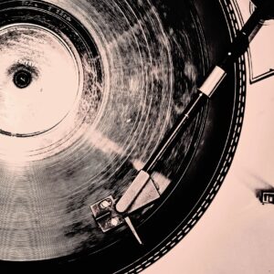 Laser-engraved cork record player mat on a clean neutral background with a subtle shadow