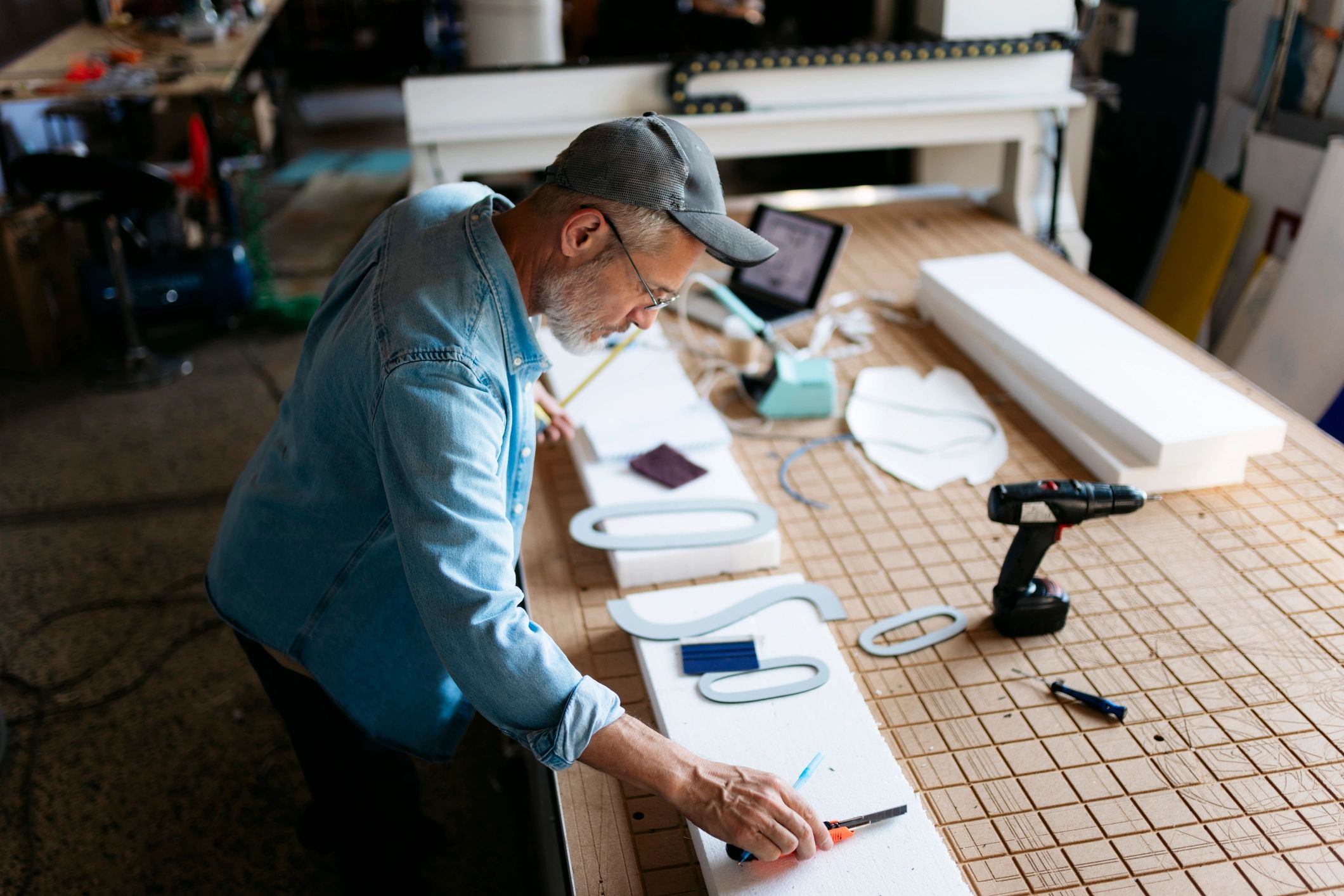 Craftsman preparing materials in a workshop