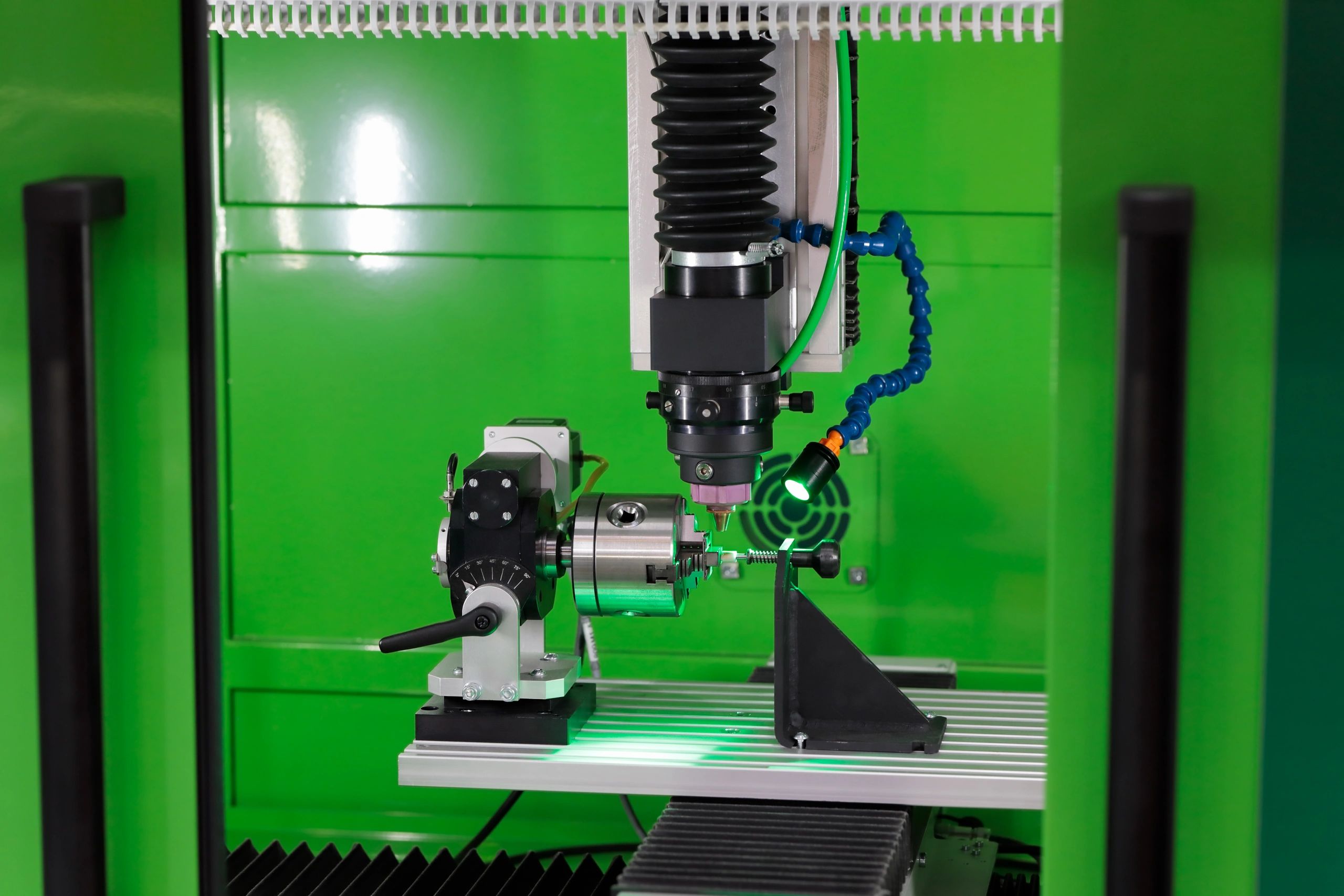 Close-up of a laser marking and engraving machine in a workshop