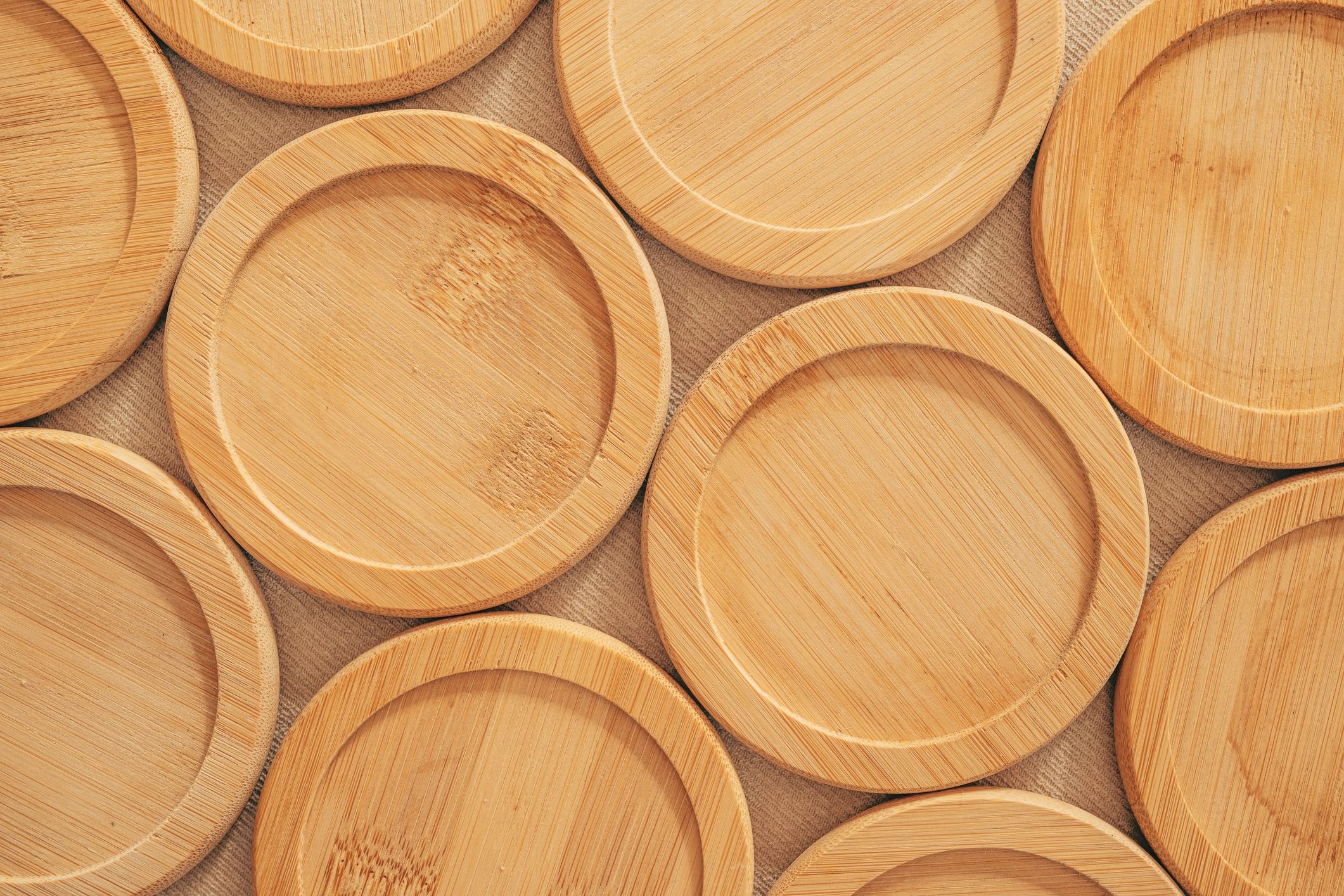 Texture of multiple bamboo round coasters top view